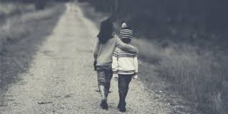 IMAGE OF TWO CHILDREN ENCOURAGING